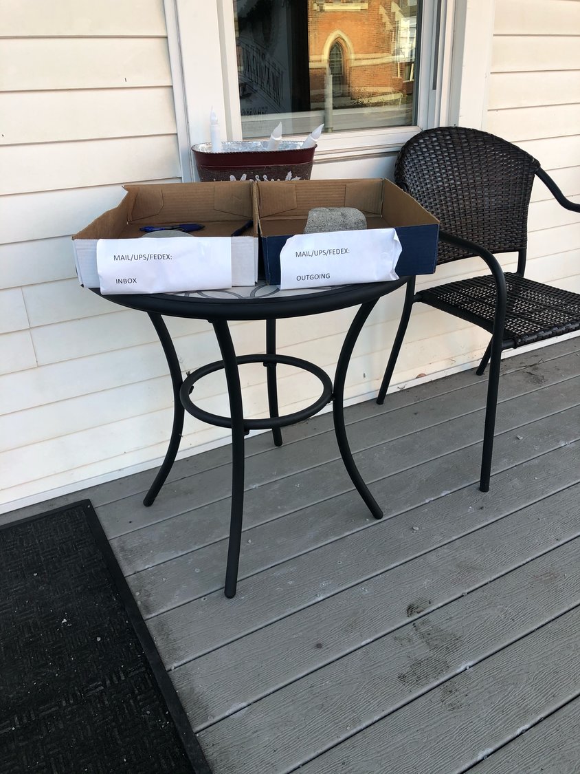 Attorney Matthew Meagher's makeshift "office" on his front porch during early COVID-19 lockdowns—how he shifted business to meet the need for real estate closings.